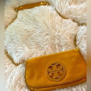 Tory Burch gently used yellow crossbody with gold hardware.